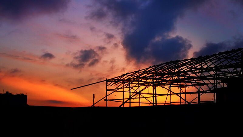 scaffold silhouette at sunset