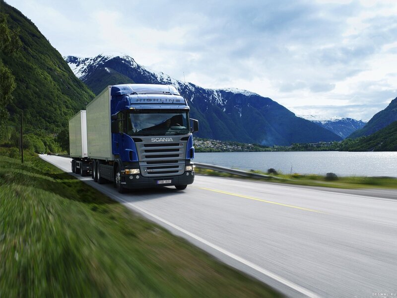 Scania truck on a scenic road