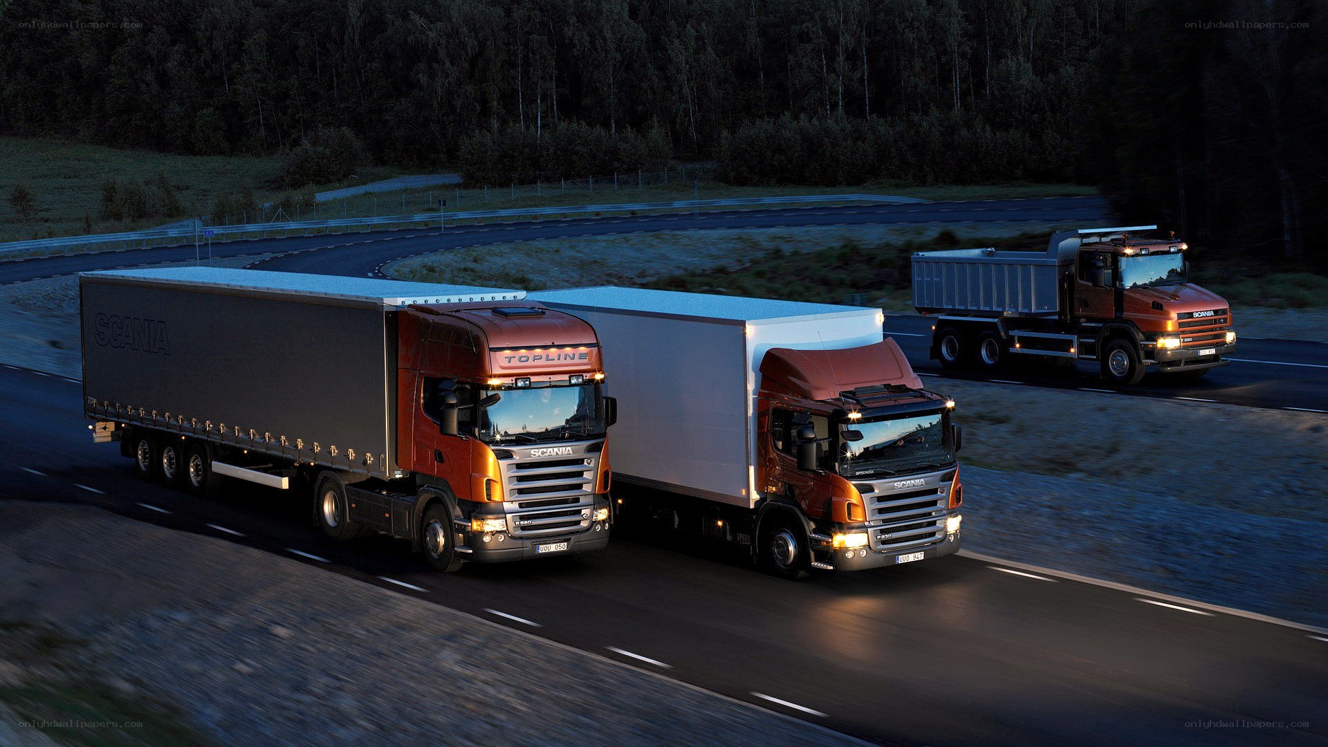 Scania trucks on a highway