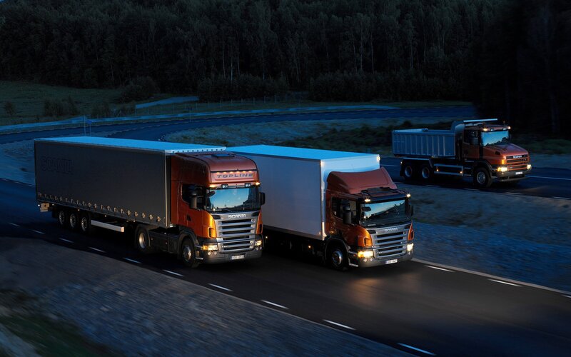 Scania trucks on a road