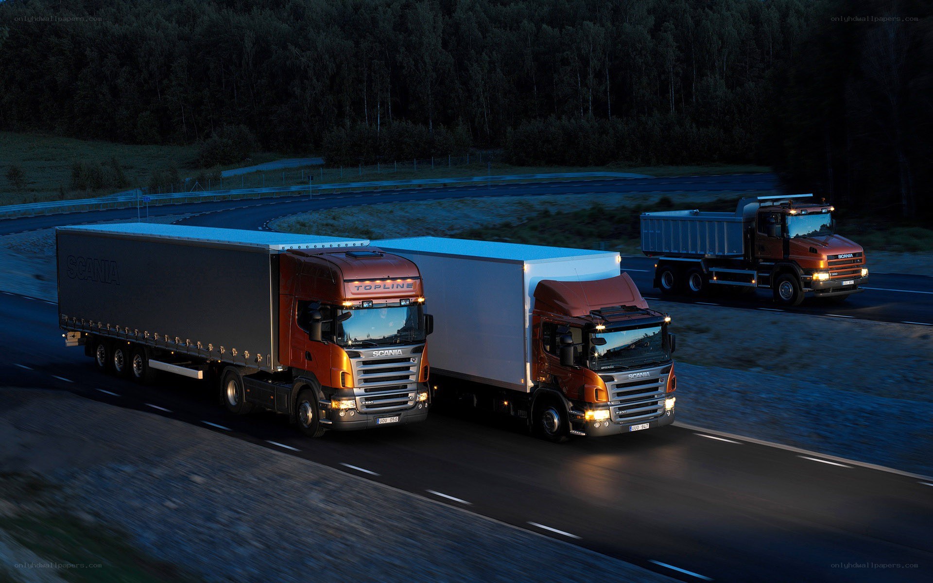 Scania trucks on a road