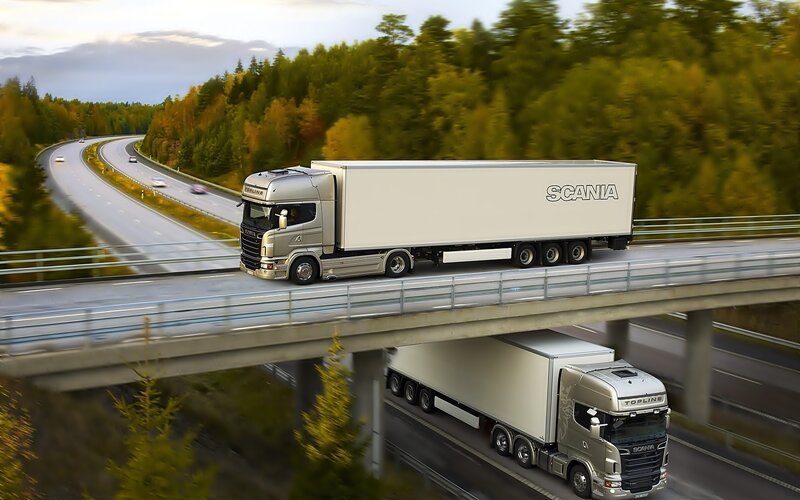 Scania Trucks on Highway — Silver