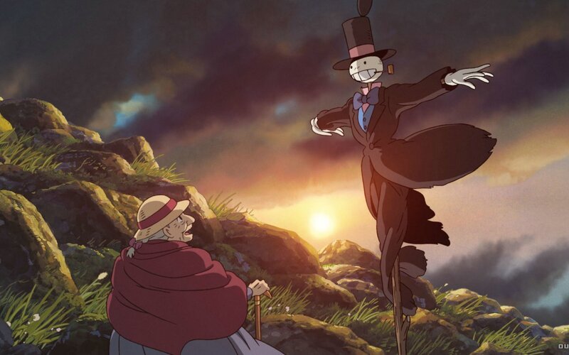 Scarecrow and old woman at sunset