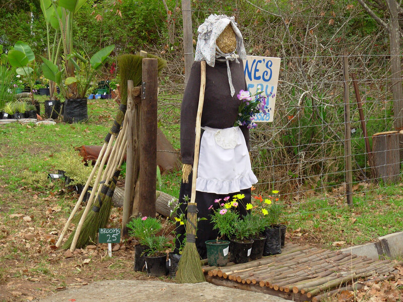 Scarecrow at a garden stand