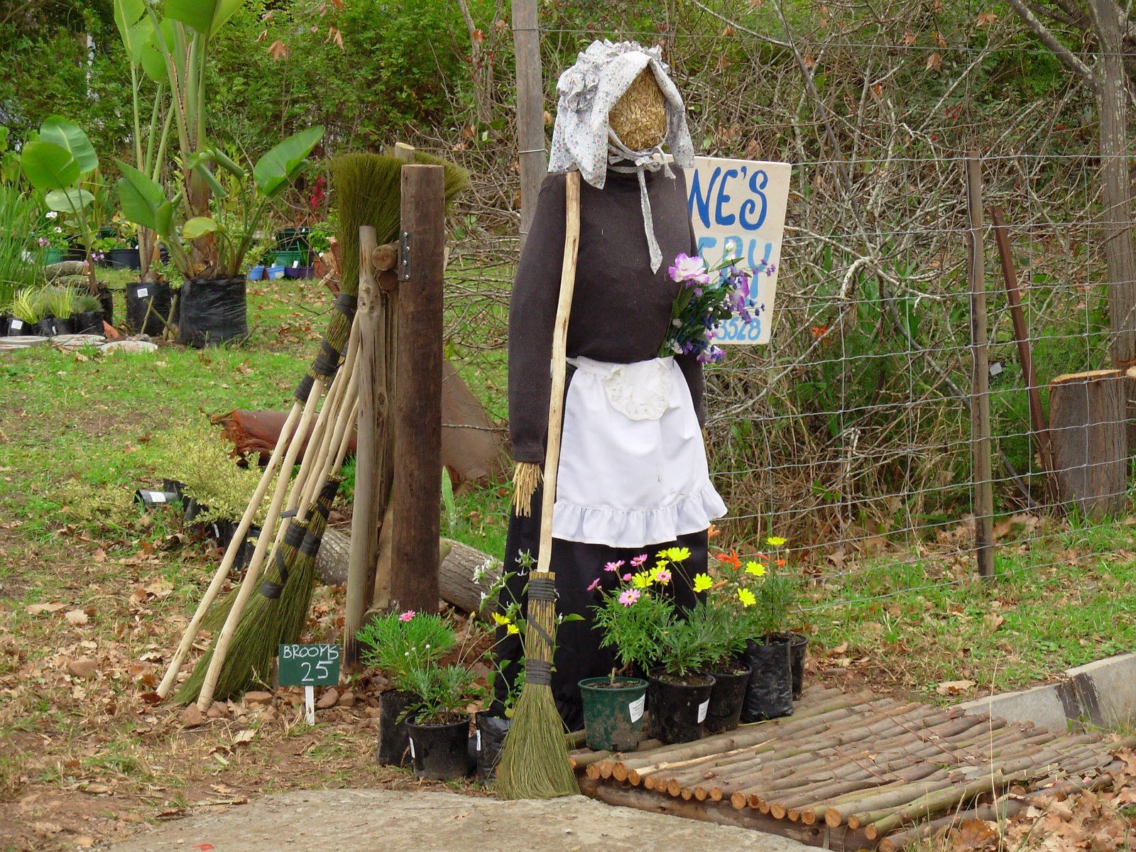 Scarecrow at a garden stand