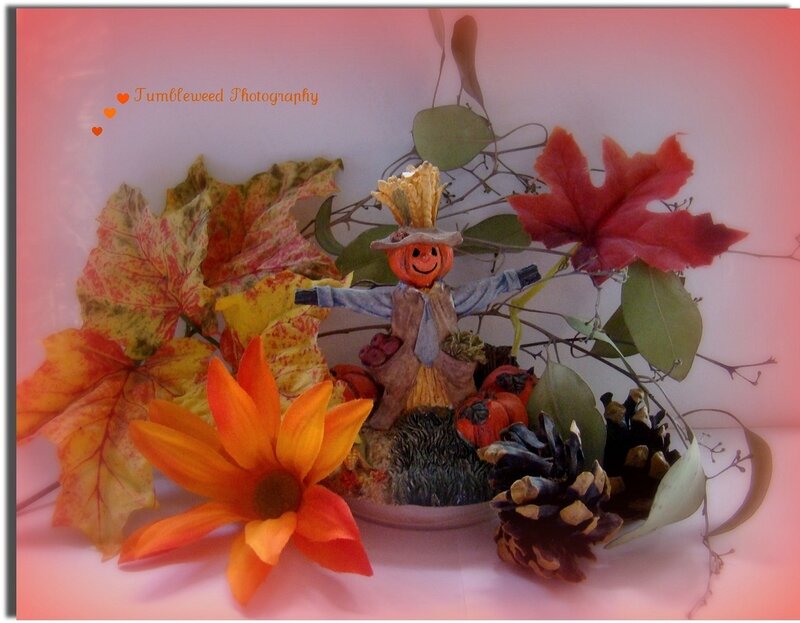 Scarecrow Figurine with Autumn Leaves
