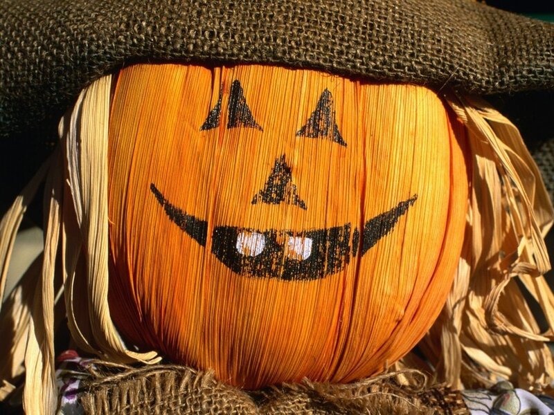 scarecrow with pumpkin face