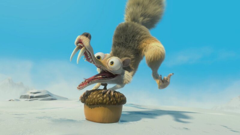 Scared squirrel on acorn