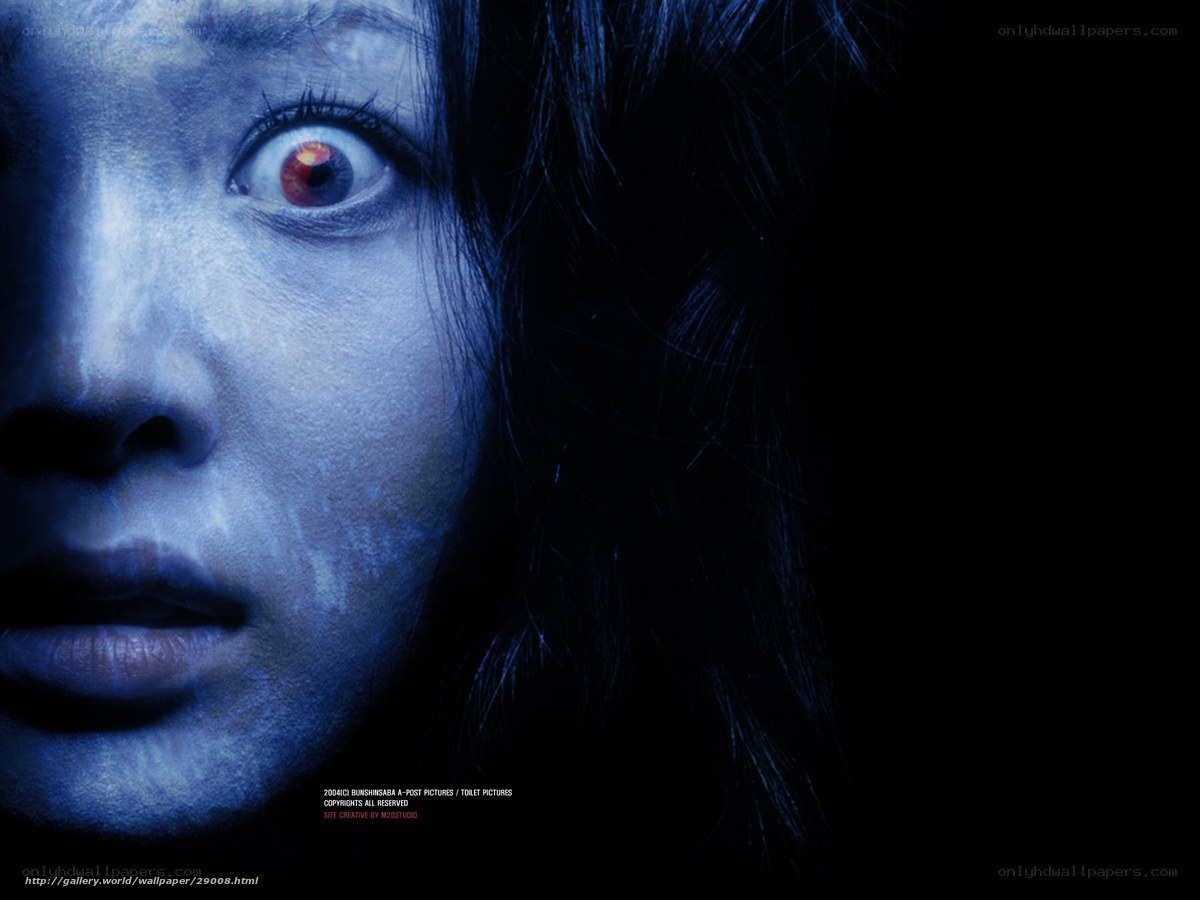 scared woman in blue light