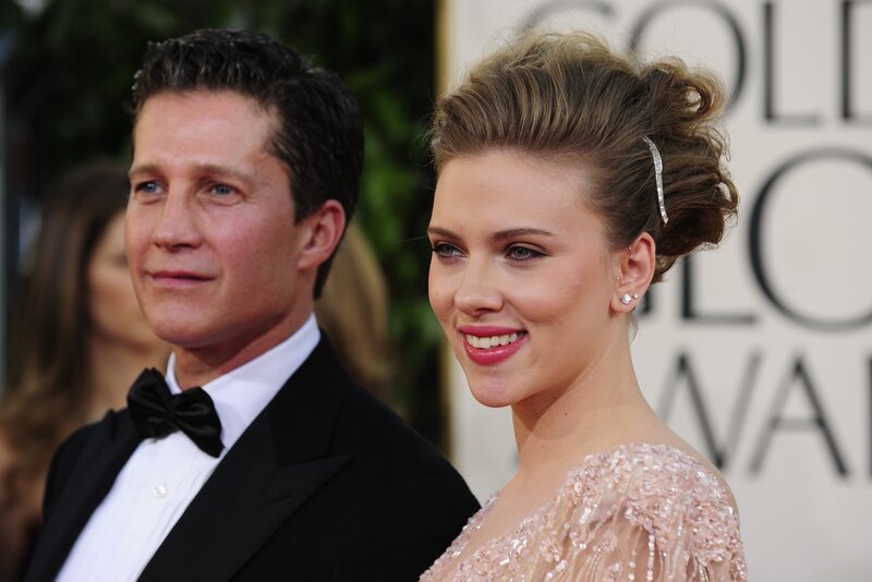 Scarlett Johansson and a man on red carpet