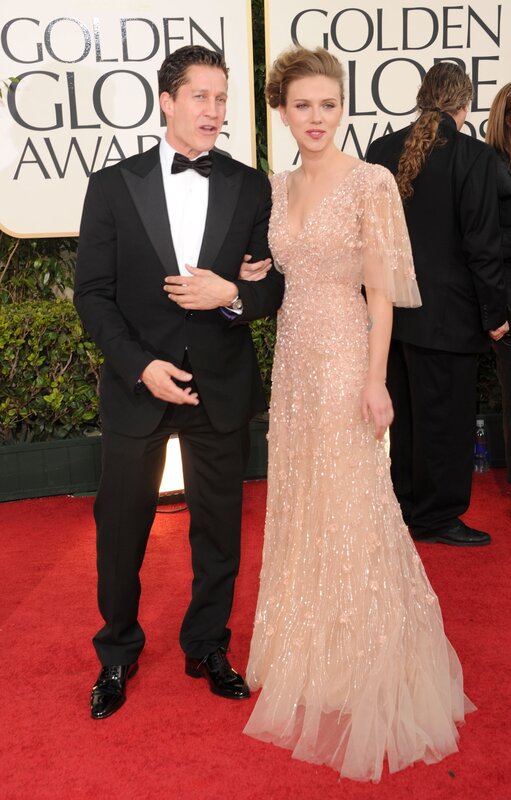 Scarlett Johansson and a man on red carpet