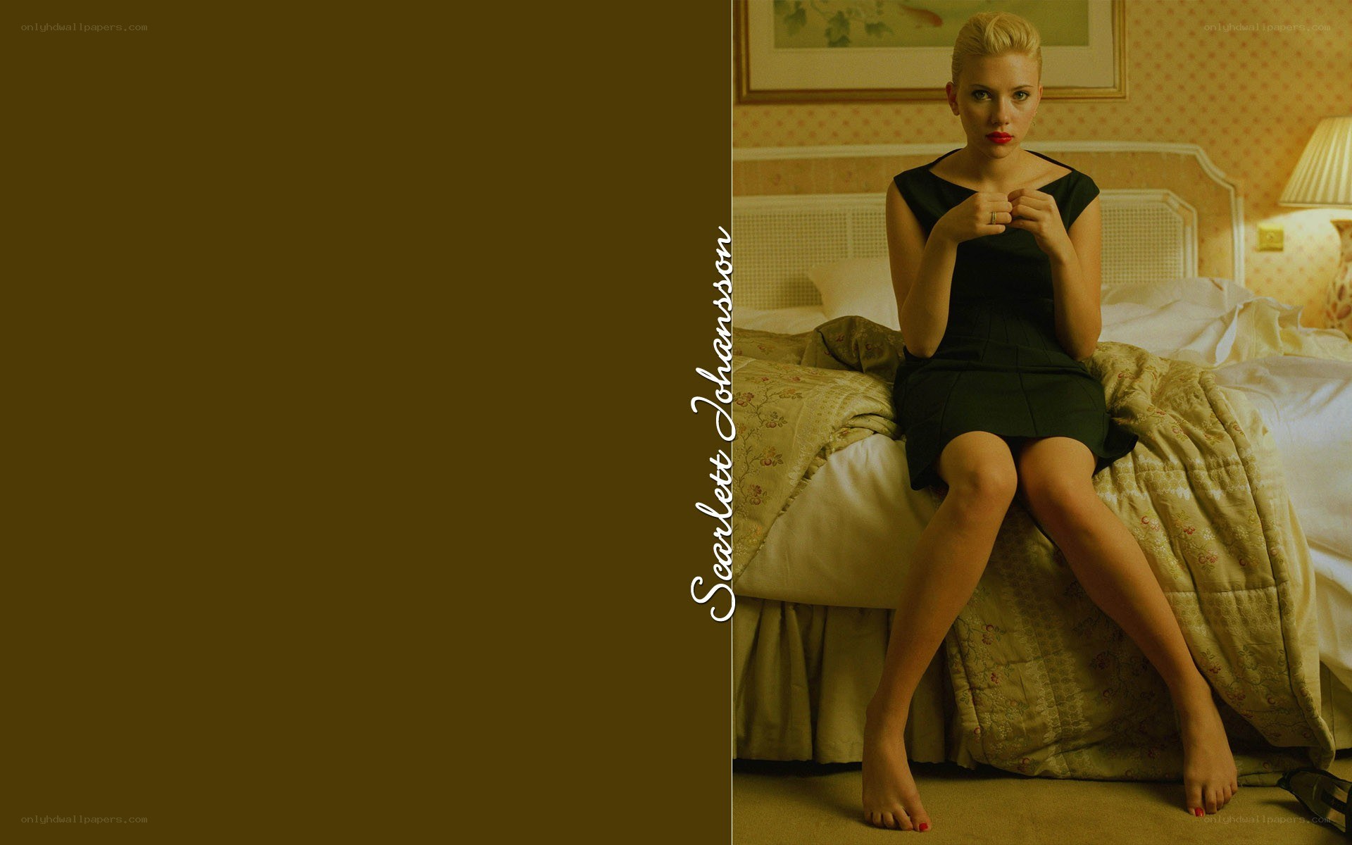 Scarlett Johansson on a bed