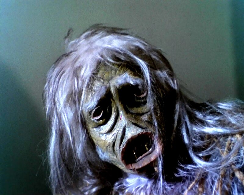 scary creature with long hair