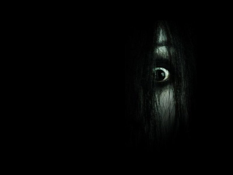 scary eye in dark hair