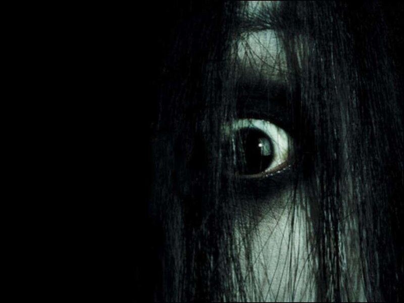 scary eye in dark hair