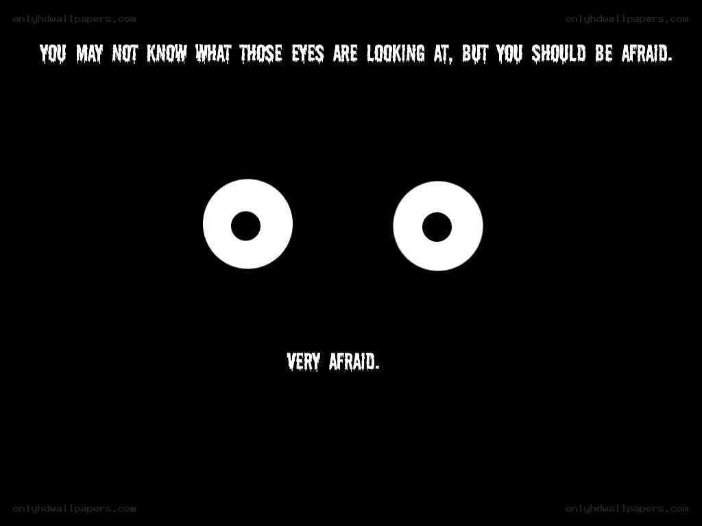 scary eyes with warning text