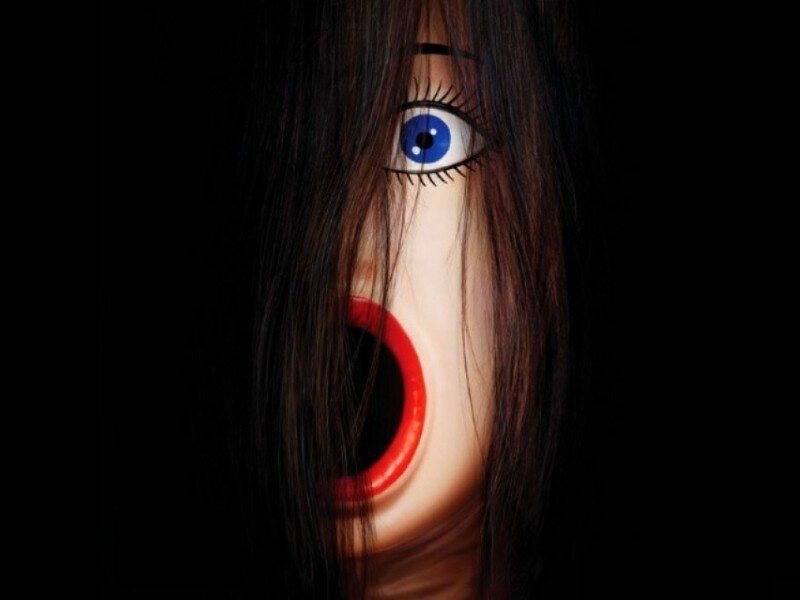 scary face with blue eye