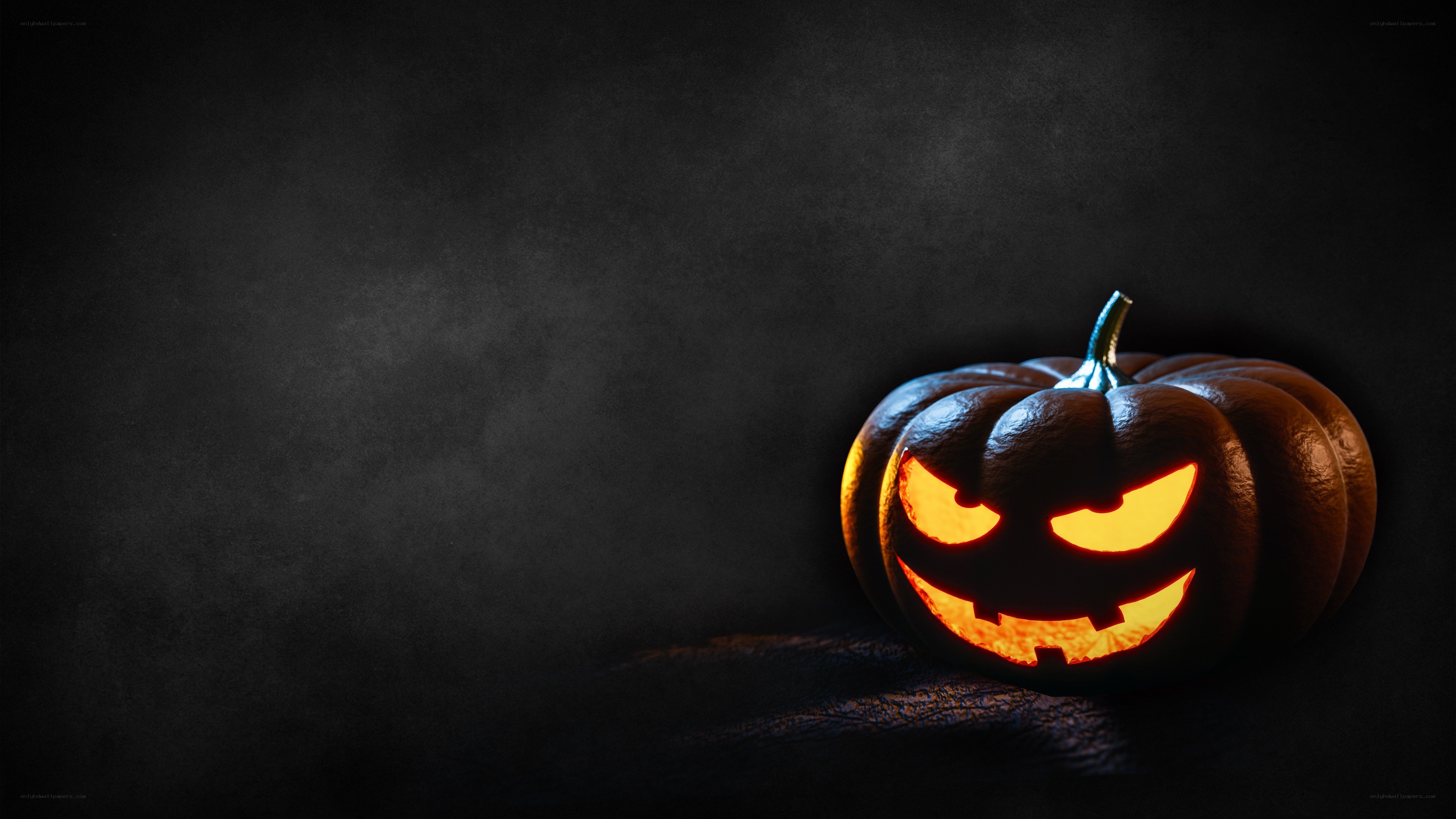 scary jack-o-lantern on black