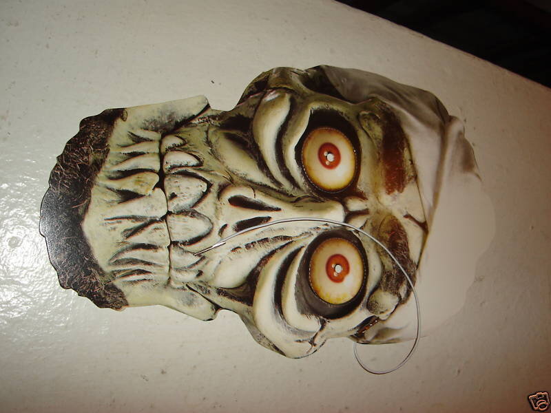 scary mask on white surface