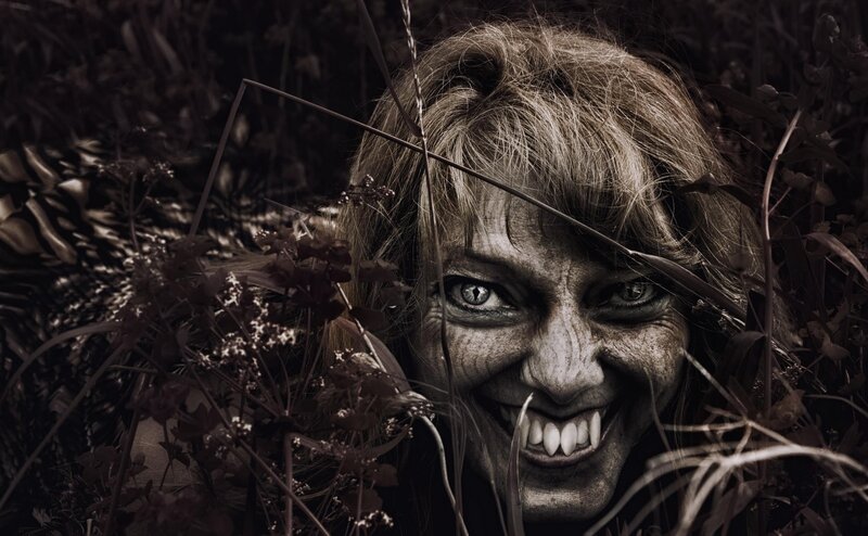 scary woman in the grass
