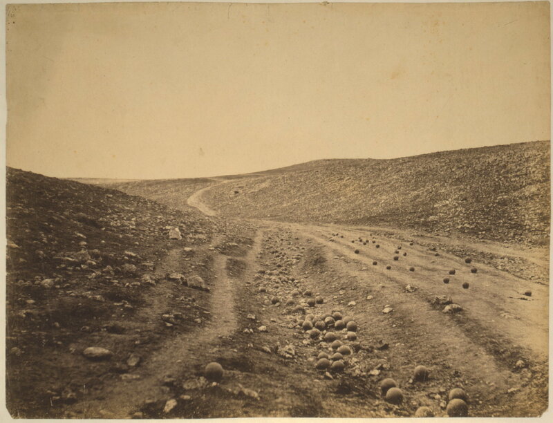 Scattered cannonballs on a hillside