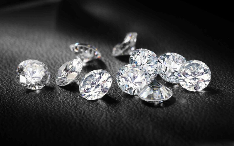 Scattered Diamonds on Black — Dramatic, Photograph, Black Surface, White