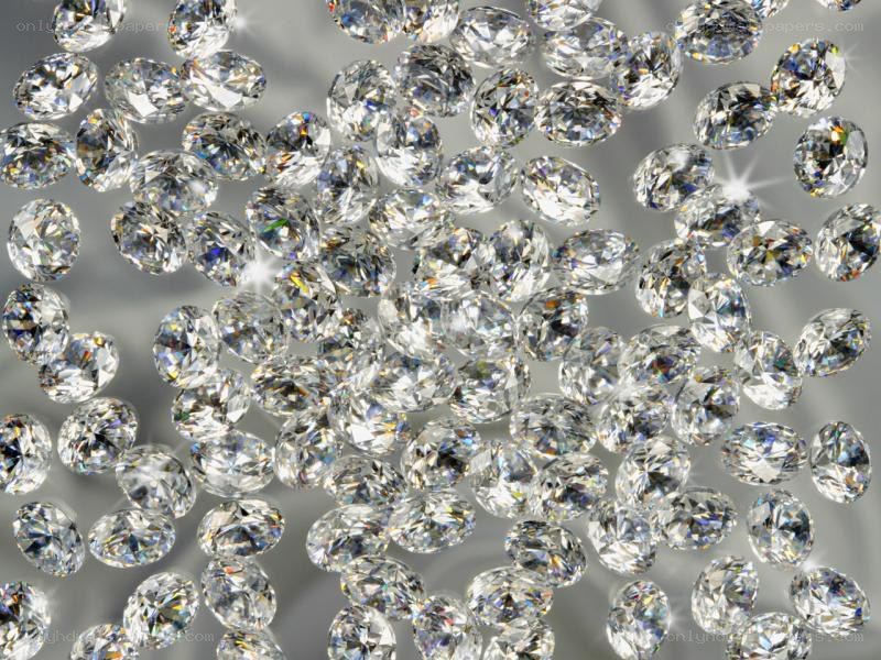 scattered diamonds on reflective surface