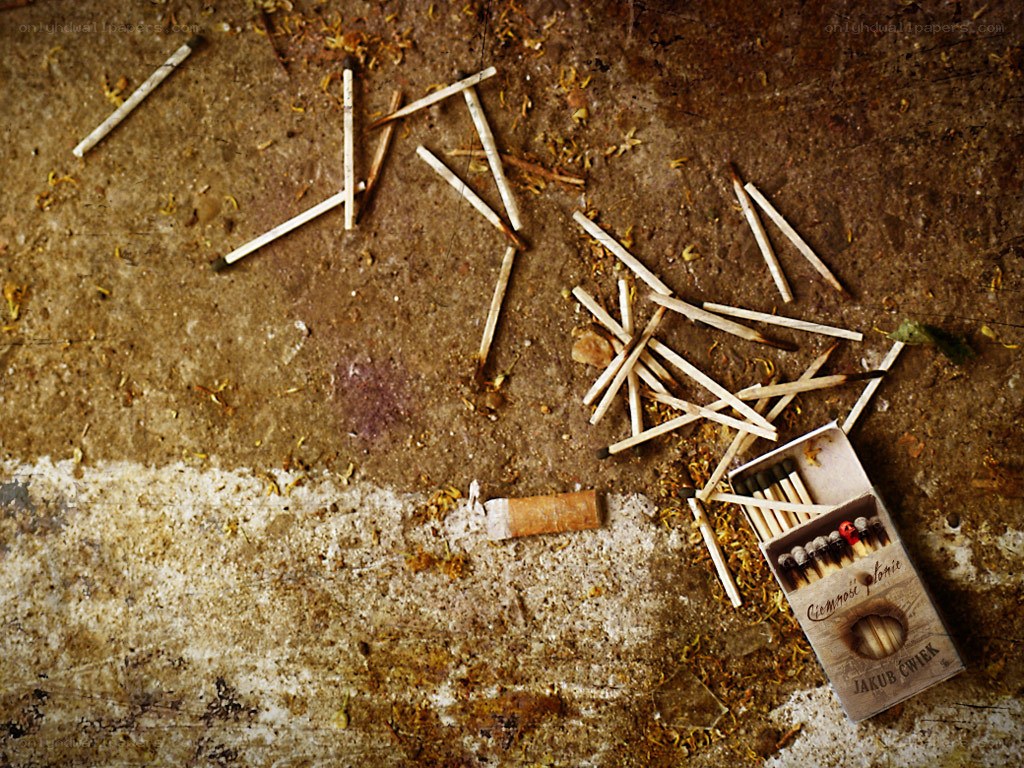 Scattered matches on dirty floor