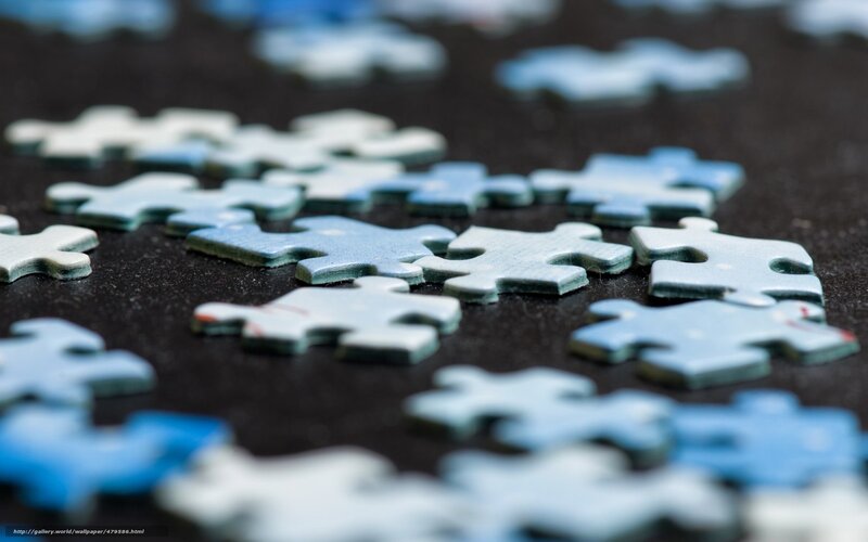 Scattered puzzle pieces