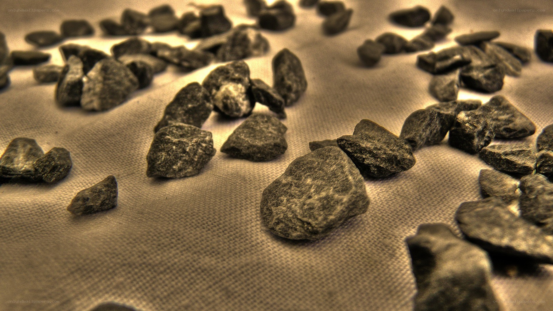 scattered rocks on fabric