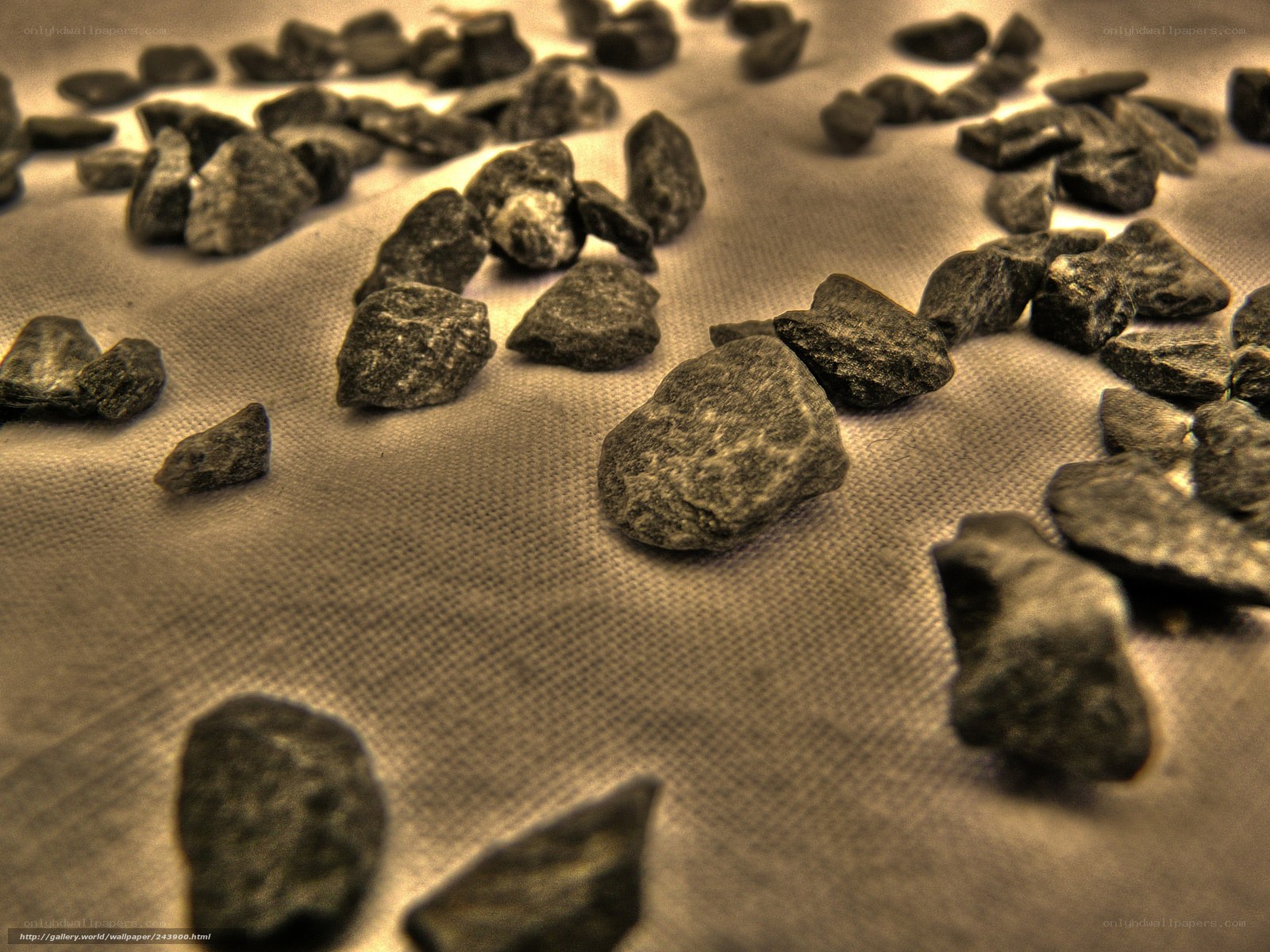 Scattered rocks on fabric