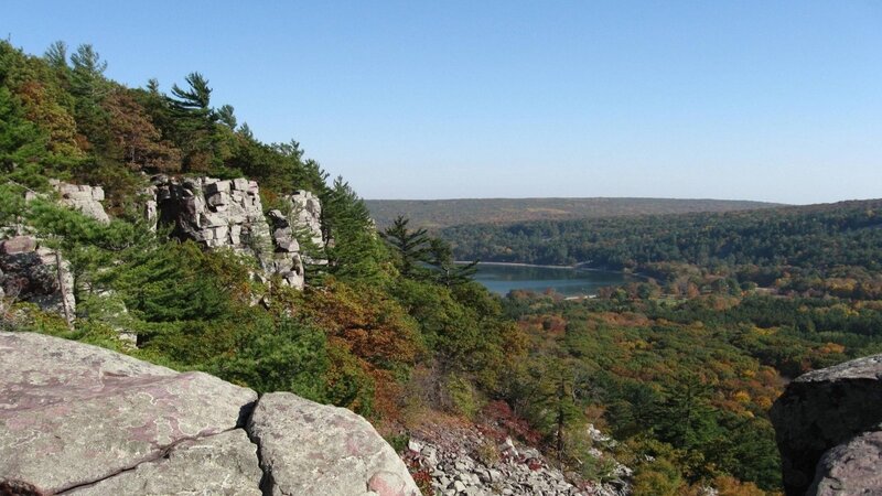 Scenic lake view from rocky cliff