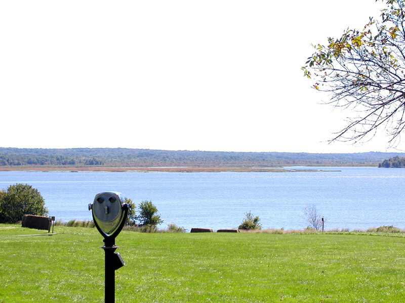Scenic lake view with binoculars