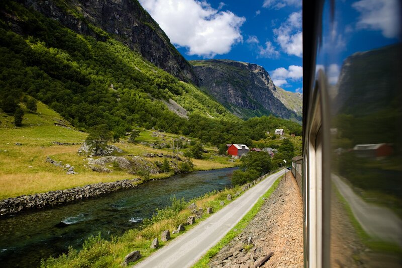 Scenic train journey through a valley
