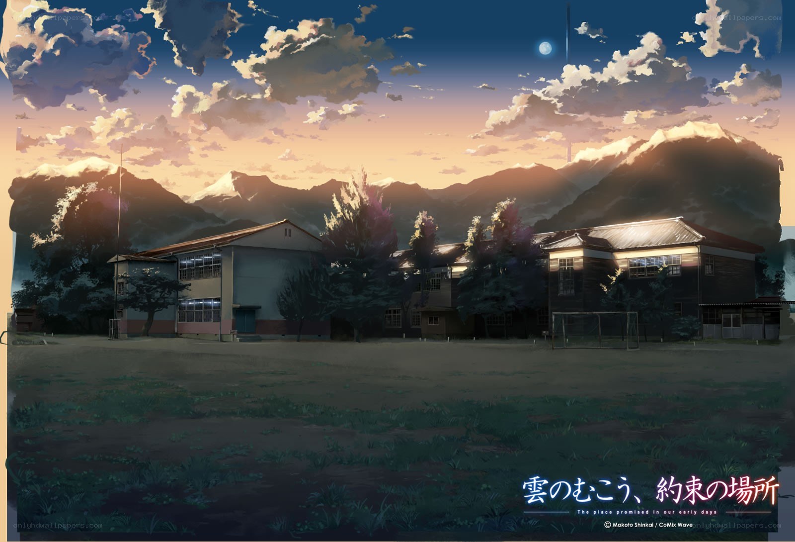 School at dusk with mountains