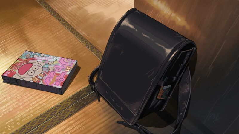 School bag and manga on tatami
