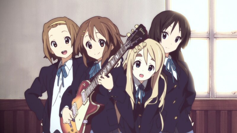 school band members with guitar