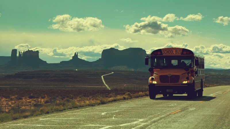 School Bus on Desert Road — Yellow