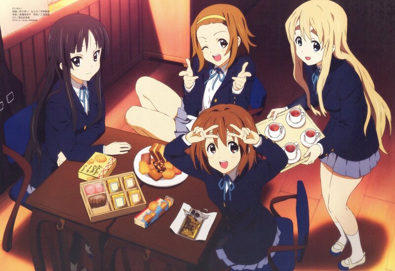 School girls having tea party