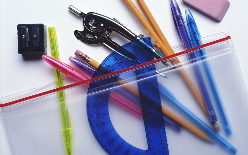 School supplies on a white surface