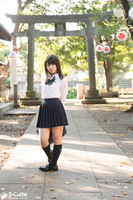 schoolgirl at a shrine