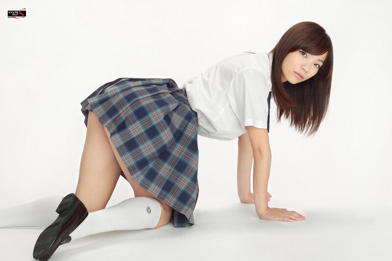 schoolgirl in plaid skirt