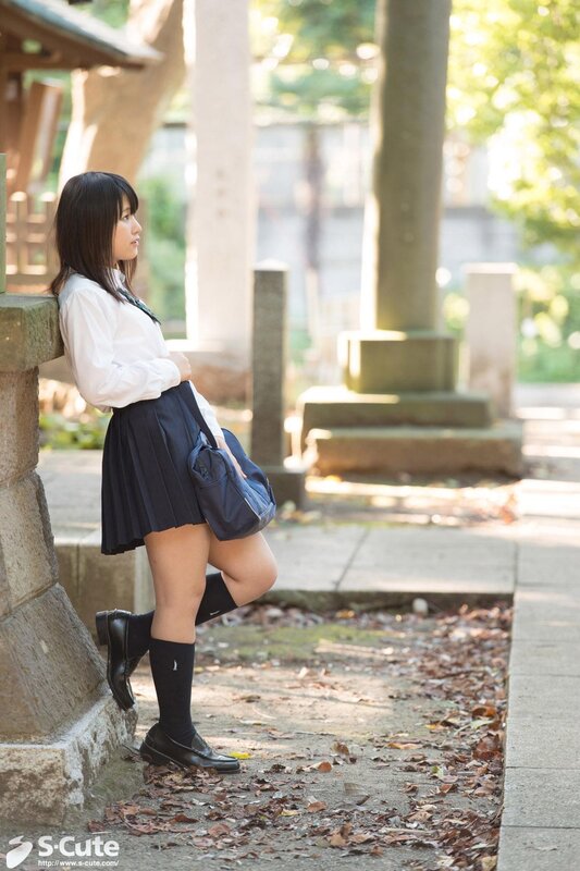 schoolgirl in uniform at shrine