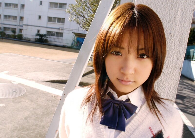 schoolgirl in uniform outdoors