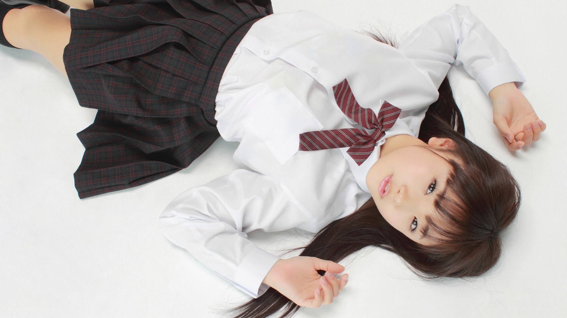 schoolgirl lying on floor
