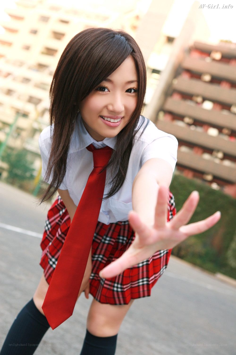 schoolgirl reaching out