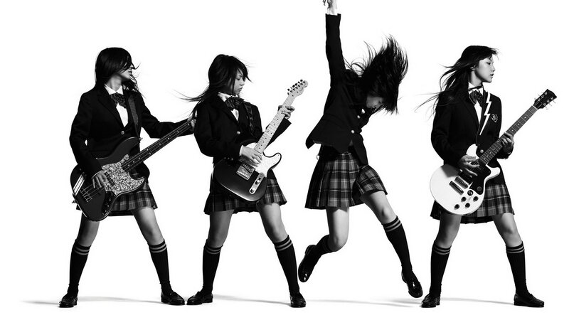 schoolgirl rock band in motion