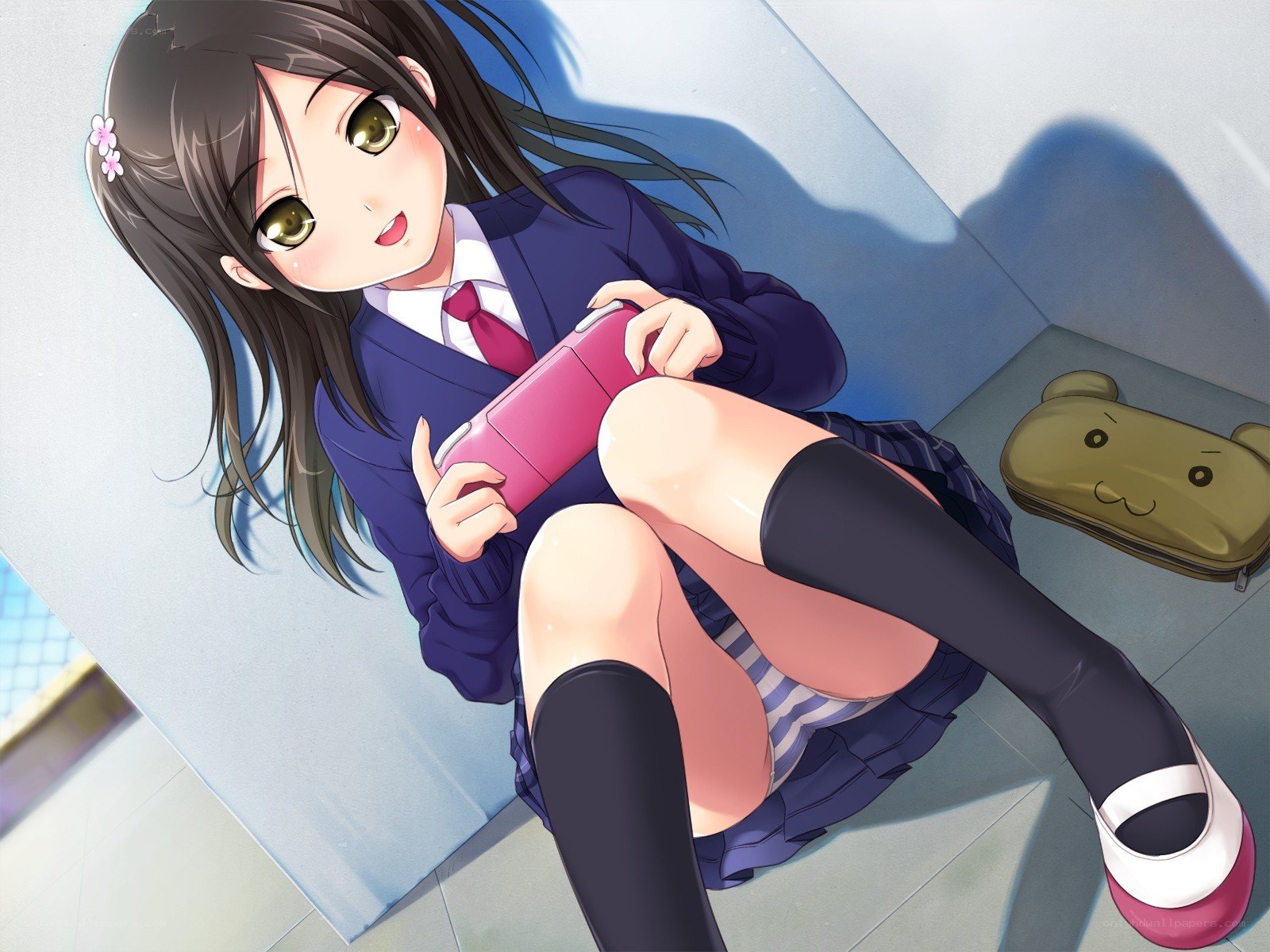 schoolgirl with handheld console