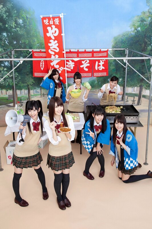 Schoolgirls at a food stall