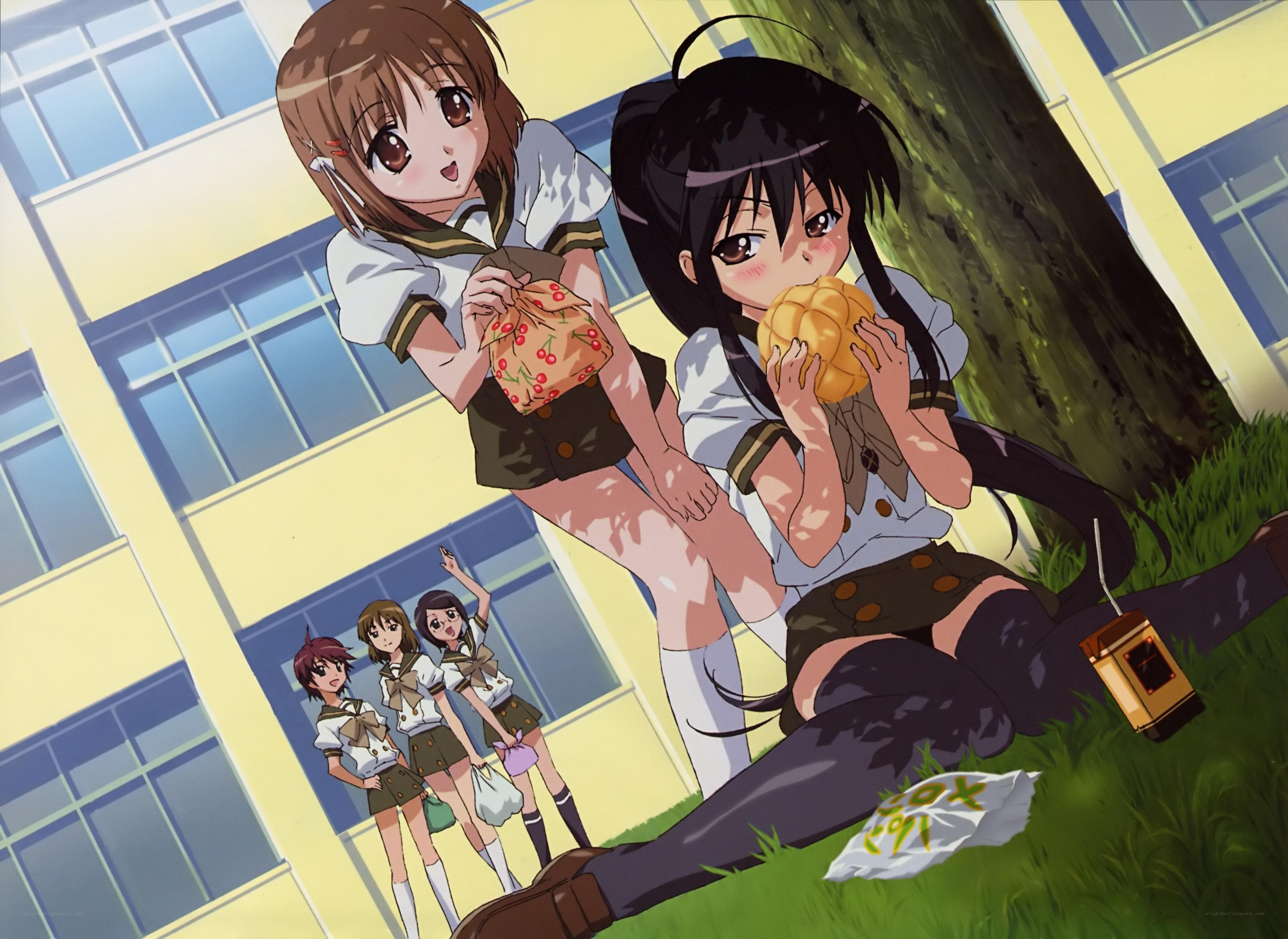schoolgirls eating snacks